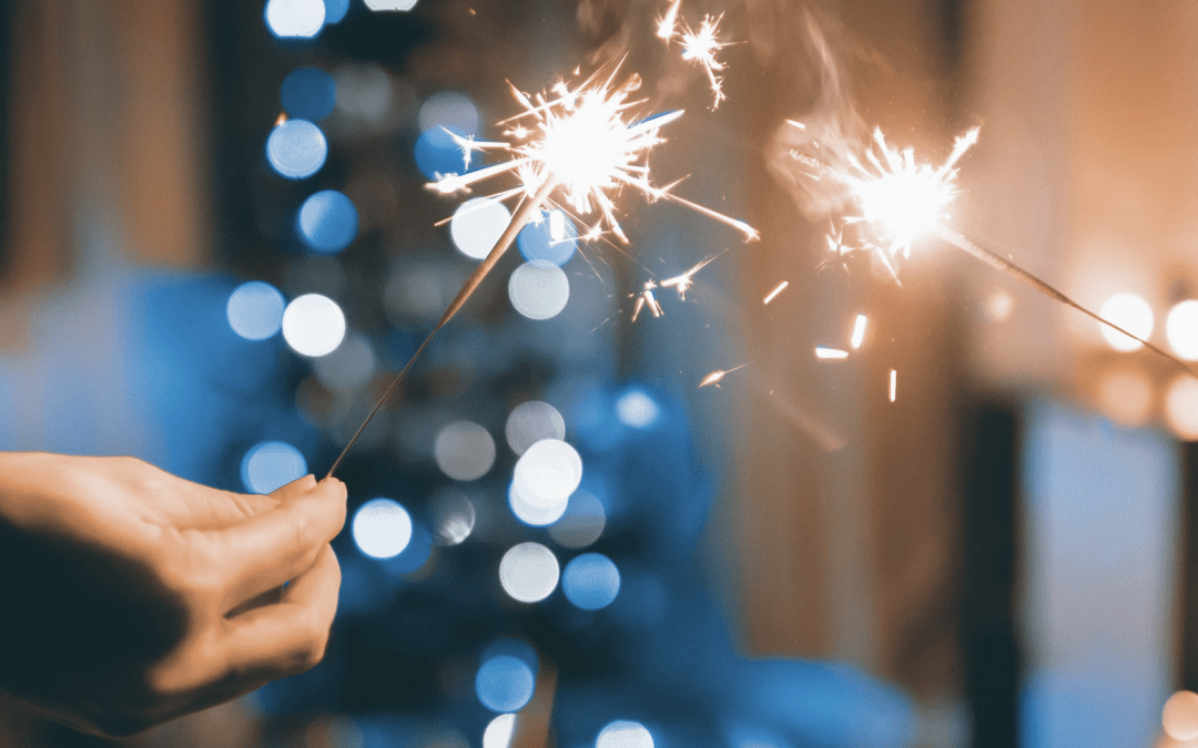 hand holding sparkler, january blues